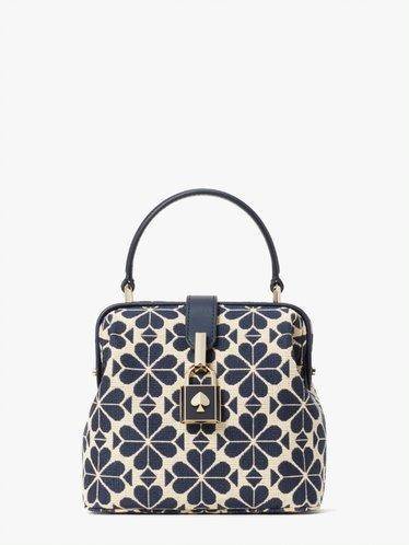 Dok. Kate Spade New York